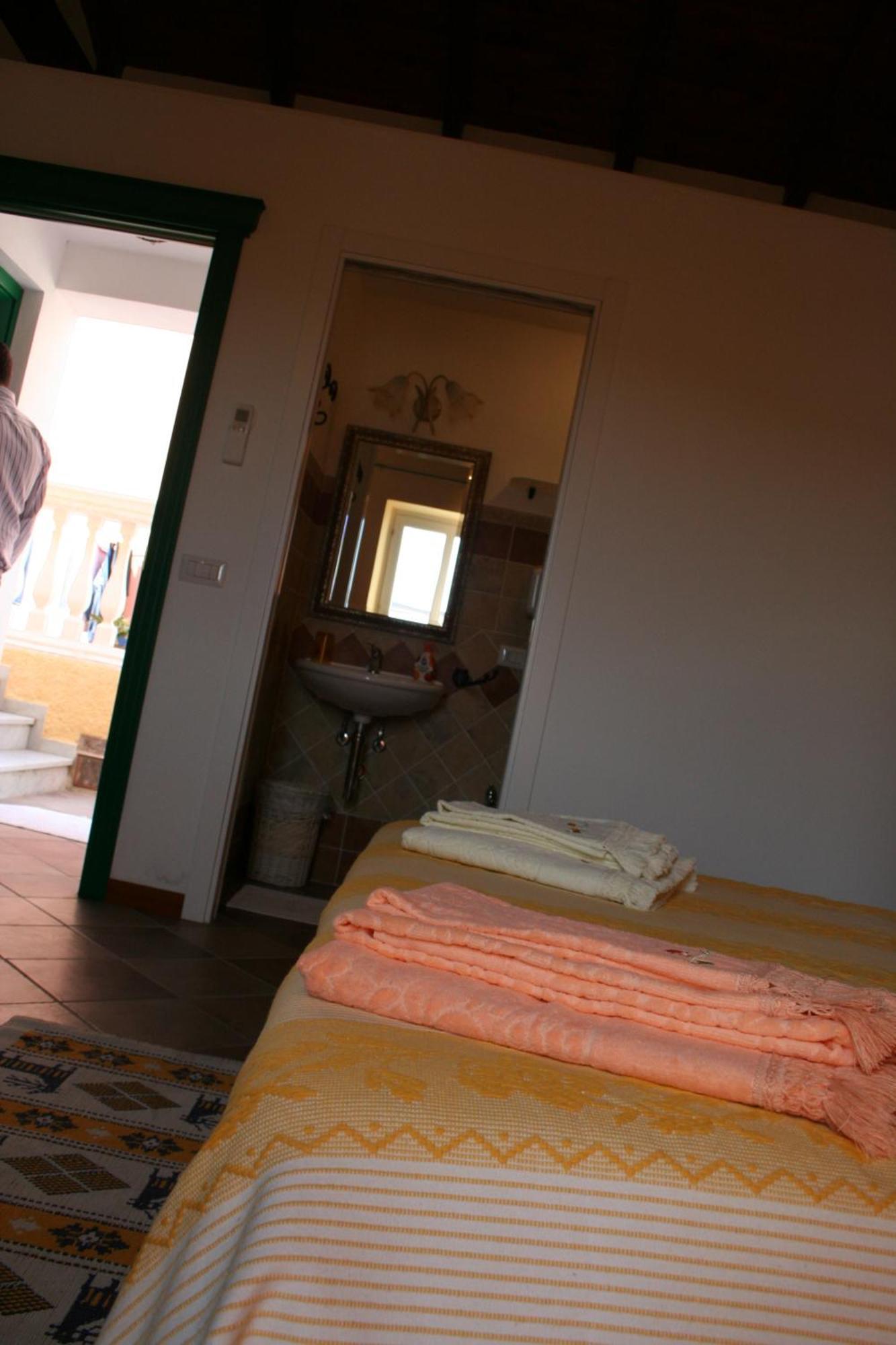 B&B Guest House Il Porto Vecchio Стинтино Номер фото