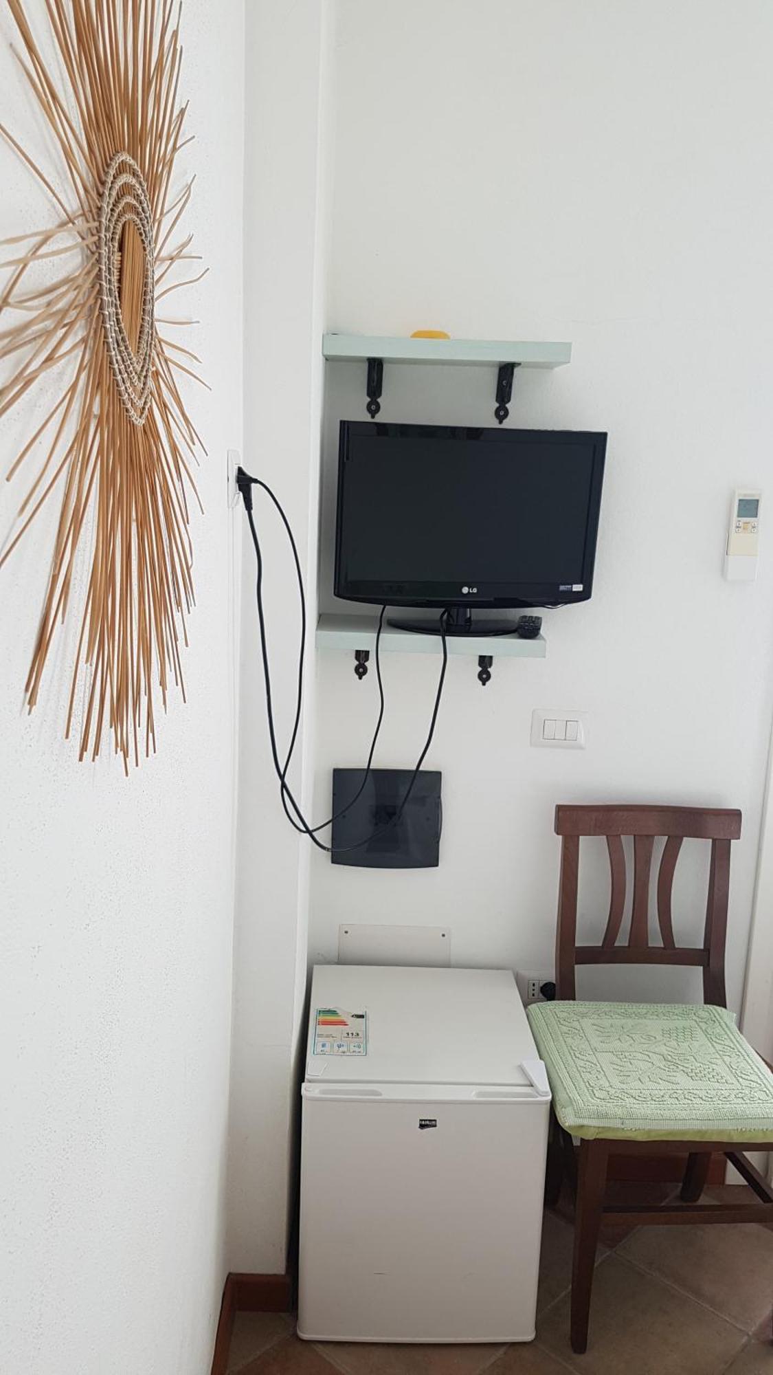 B&B Guest House Il Porto Vecchio Стинтино Номер фото